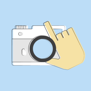 Illustration of a hand adjusting the focus of a camera lens.